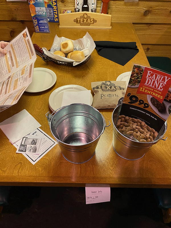 We were greeted at our table by the cleanest peanut buckets ever and peanuts in a separate bag instead of loose in one of the buckets. This was the first serious sign we saw of changes due to COVID-19.