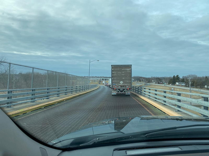 This line of vehicles at the border crossing in Ogdensburg, New York, is twice as long as the longest one we've ever been in here. A lot of Canadians are hurrying home due to COVID-19.