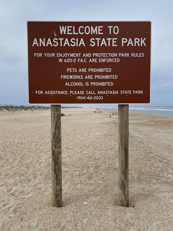 A sign welcomes us to Anastasia State Park in St. Augustine, Florida.