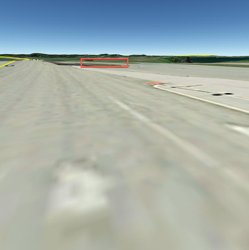 We weren't allowed to take a picture of the X-Ray building at the USA border crossing. So, I figured I'd try Google's street view. To my surprise, the building is simply missing in the street view. The red rectangle shows the part of the road that should be inside the missing building.
